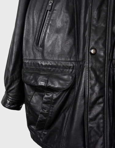Make a statement with this timeless vintage black nappa leather coat. Crafted from fine leather and designed to flatter, this versatile piece will keep you warm with adjustable tie waist and provide a classic yet modern look. Get ready to stand out!