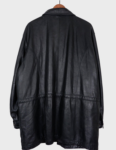 Make a statement with this timeless vintage black nappa leather coat. Crafted from fine leather and designed to flatter, this versatile piece will keep you warm with adjustable tie waist and provide a classic yet modern look. Get ready to stand out!