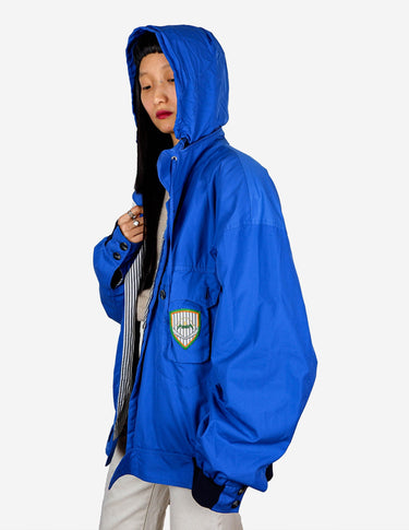 Zip into this Premium Bogner blue hooded jacket (very thin) and make a statement! It's designed with shoulder pads and comes with a hidden hood, so you can always make a quick and effortless transition.