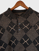 a woman is wearing a 80s brown vintage abstract pattern sweater.