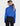a blonde woman is wearing a blue 80s vintage turtleneck sweater.