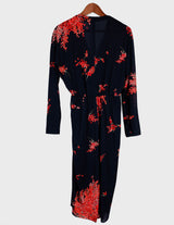 a woman with blonde hair is wearing a vintage 80s 90s floral maxi dress.