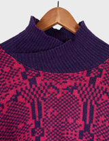 a woman is wearing a 80s dark pink geometric turtleneck sweater.