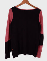 an asian woman is wearing a pink sweater.