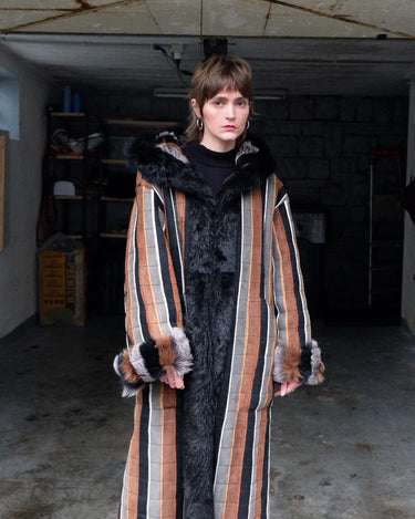 Embrace statement pieces like our premium handmade vintage 70s long multi-color leather coat! Expertly crafted with leather and a luxurious real fur lining, this statement piece blends bold style with cozy warmth. Perfect for those who love unique fashion - this coat is a must-have for size M - L.