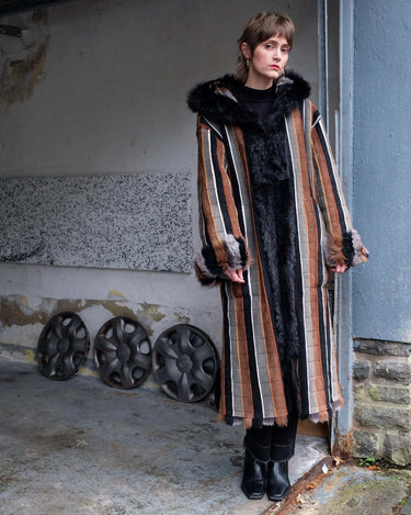 Embrace statement pieces like our premium handmade vintage 70s long multi-color leather coat! Expertly crafted with leather and a luxurious real fur lining, this statement piece blends bold style with cozy warmth. Perfect for those who love unique fashion - this coat is a must-have for size M - L.