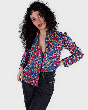 Sparkle like the '80s, but with of colors in this very thin and light transparent blouse. Please keep in mind, that some parts of the hem were handsewn /reworked by me (last photo).