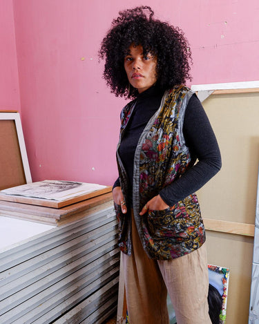 Shimmer your way with this vintage ultra-thin vintage 80s 90s vest, featuring a colorful floral design.