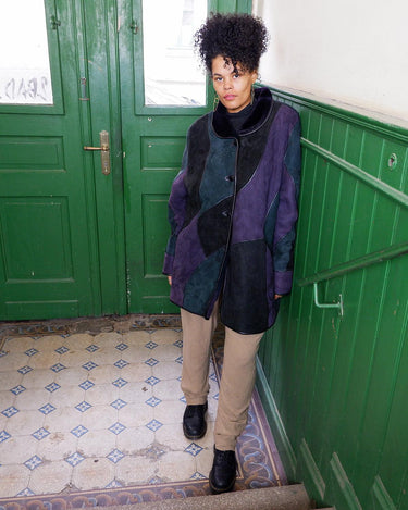   This vintage 80s shearling coat is made for patchwork lovers! Get ready to embrace it!