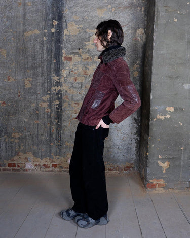 Slay the patchwork pattern look with this vintage Redbrown leather jacket with its removable fake fur collar.