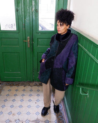   This vintage 80s shearling coat is made for patchwork lovers! Get ready to embrace it!