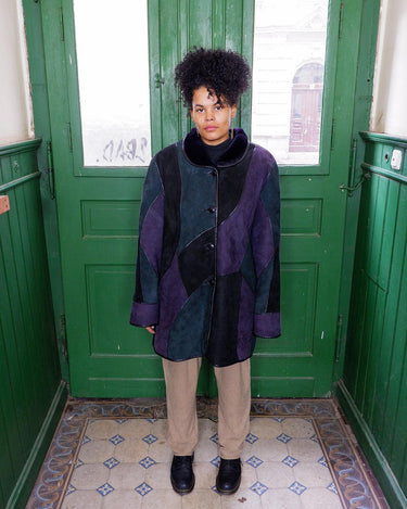 This vintage 80s shearling coat is made for patchwork lovers! Get ready to embrace it!