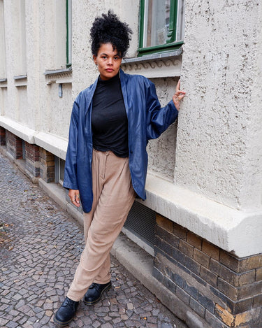 Own the coolest blue leather jacket in town with this vintage 80s jacket. Its wide sleeves and light shoulder pads add extra flair while keeping you comfortable
