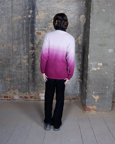 Wrap yourself in a hug with this vintage 90s cozy pink ombre colored sweater. Perfect for M - L sizes, this piece adds a pop of unique color to your wardrobe. Sweater weather, anyone?