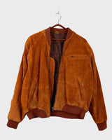 Add a touch of timeless style to your wardrobe with our Vintage 80s Bomber Leather Jacket. Crafted with classic brown leather, this jacket is a must-have for any fashion enthusiast. Embrace the distinctive vintage look!