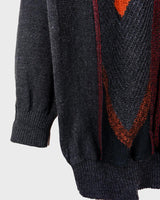Get ready to embrace some 90s vibes with this vintage grey and orange geometric pattern sweater! Perfect for a cozy look!