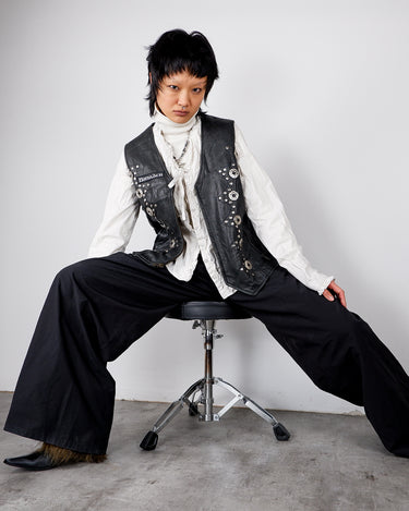 Vintage 90s black biker leather vest with conchos and patches | L-XL