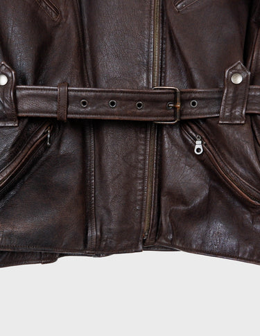 Look sharp in this vintage 80s chocolate brown belted biker leather jacket! Be the baddest biker on the block with this classic piece. Perfect for adding some edge to your look with a bit of attitude. Get ready to hit the highway!