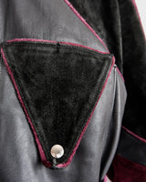 Experience the edgy and unique style of the 80s with our Vintage Black/Burgundy Patchwork Biker Leather Jacket. Crafted from high-quality leather, this jacket features a bold color combination of black and burgundy.