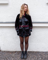 Experience the edgy and unique style of the 80s with our Vintage Black/Burgundy Patchwork Biker Leather Jacket. Crafted from high-quality leather, this jacket features a bold color combination of black and burgundy.