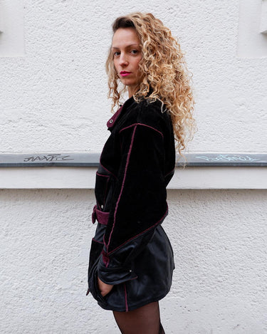 Experience the edgy and unique style of the 80s with our Vintage Black/Burgundy Patchwork Biker Leather Jacket. Crafted from high-quality leather, this jacket features a bold color combination of black and burgundy.