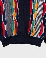Snag this classic, colorful Emilio Enzo "coogie style" sweater for that vintage '90s vibe! It's got that retro flair you need!