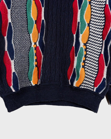 Snag this classic, colorful Emilio Enzo "coogie style" sweater for that vintage '90s vibe! It's got that retro flair you need!