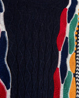 Snag this classic, colorful Emilio Enzo "coogie style" sweater for that vintage '90s vibe! It's got that retro flair you need!