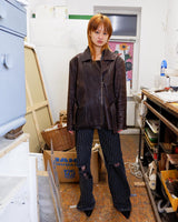 Look sharp in this vintage 80s chocolate brown belted biker leather jacket! Be the baddest biker on the block with this classic piece. Perfect for adding some edge to your look with a bit of attitude. Get ready to hit the highway!