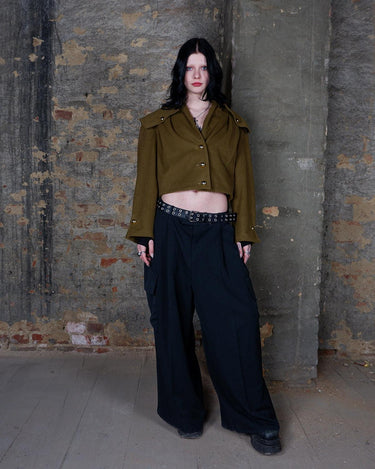 Add a touch of luxury to your wardrobe with this timeless Vintage 90s green/khaki cashmere mix jacket! With its unique blend of cashmere and shoulder pads for added structure, this jacket will elevate any outfi!