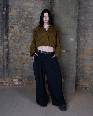 Add a touch of luxury to your wardrobe with this timeless Vintage 90s green/khaki cashmere mix jacket! With its unique blend of cashmere and shoulder pads for added structure, this jacket will elevate any outfi!