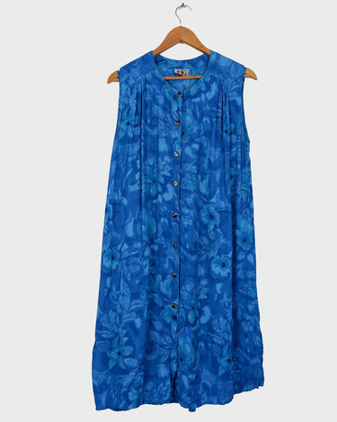 Make every summer night magical in this Vintage 80s blue light transparent viscose dress! It features delicate floral pattern detail, and is ultra lightweight – so you can float through the night with ease! 