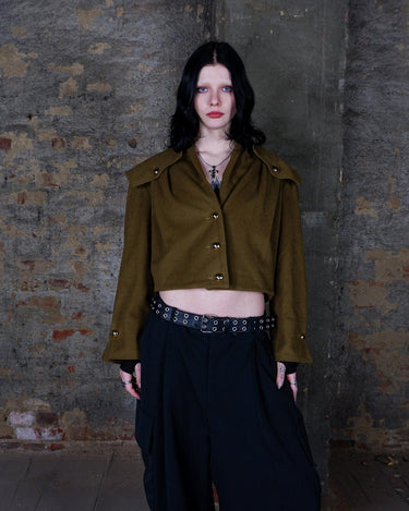 Add a touch of luxury to your wardrobe with this timeless Vintage 90s green/khaki cashmere mix jacket! With its unique blend of cashmere and shoulder pads for added structure, this jacket will elevate any outfi!