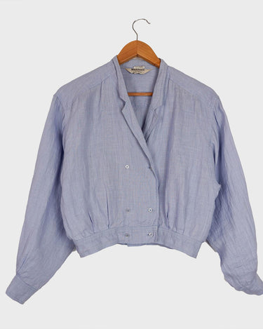   A sprinkle of '80s! This vintage crop blouse in light blue & lavender undertone will add some elegant vibes to your wardrobe. Get groovy with its 100% linen fabric!