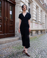 Capture the sleek vibes of the 90s in this black ripped elastic dress! The ripped and elastic material will hug your body in all the right places. You can even customize your look with the option to tie it up at the back. Wear this 90s dream with confidence! Let's gooo!
