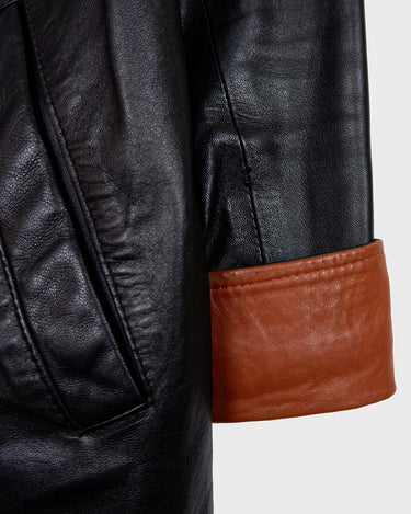 Bring some edge to your wardrobe with this lightweight and very thin vintage 80s black leather jacket - perfect for spring and summer nights! The brown accents add a touch of contrast, while the convenient zipper and press buttons allow for versatile styling. What are you waiting for?