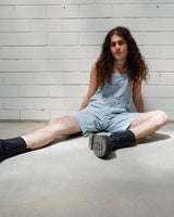 This vintage 90s denim blue dungaree is made for denim-lovers! An adjustable length gives you the freedom to style it however you want! 