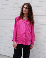 This pink blouse will have you feelin' those '80s vibes! Enjoy all that extra sparkle with this glitzy long sleeve look!