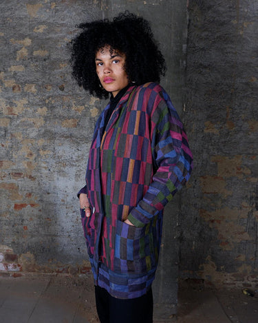 Introducing our PREMIUM vintage 80s cotton blazer made with bold, colorful block stripes! Handmade for a unique style, this blazer is perfect for standing out in the crowd. Show off your playful side with this thick and vibrant statement piece.