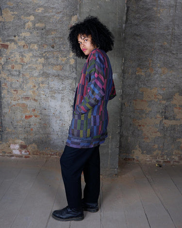 Introducing our PREMIUM vintage 80s cotton blazer made with bold, colorful block stripes! Handmade for a unique style, this blazer is perfect for standing out in the crowd. Show off your playful side with this thick and vibrant statement piece. 