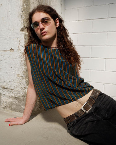 Vibe on all those 90s vibes with this one-of-a-kind vintage viscose top! Striped and with waving details, you can flaunt your style in this timeless piece. Just don't forget to bring the sunnies!