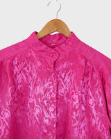This pink blouse will have you feelin' those '80s vibes! Enjoy all that extra sparkle with this glitzy long sleeve look!