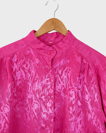 This pink blouse will have you feelin' those '80s vibes! Enjoy all that extra sparkle with this glitzy long sleeve look!