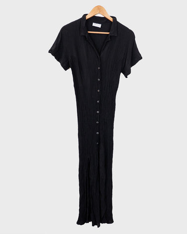 Capture the sleek vibes of the 90s in this black ripped elastic dress! The ripped and elastic material will hug your body in all the right places. You can even customize your look with the option to tie it up at the back. Wear this 90s dream with confidence! Let's gooo!