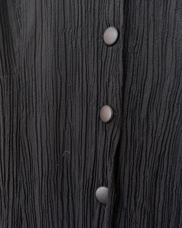 Capture the sleek vibes of the 90s in this black ripped elastic dress! The ripped and elastic material will hug your body in all the right places. You can even customize your look with the option to tie it up at the back. Wear this 90s dream with confidence! Let's gooo!
