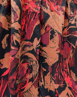 This Vintage 80s blouse is eccentric and elegant in all the right places! With its eye-catching crazy pattern and elastic hem, you'll be ready to go! So, if you're looking for something a little wild, this is the one for you! Please keep in mind, that the sleeves are shorter than usual.