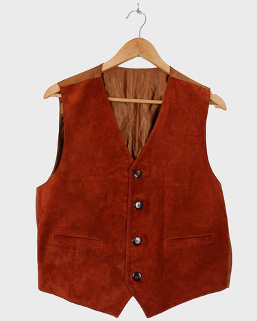 This Vintage 90s brown classy suede leather vest is taking boho vibes to the max! Complete your next festival look in with this vest.