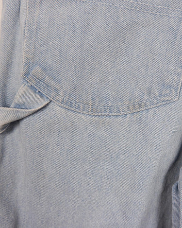 This vintage 90s denim blue dungaree is made for denim-lovers! An adjustable length gives you the freedom to style it however you want! 