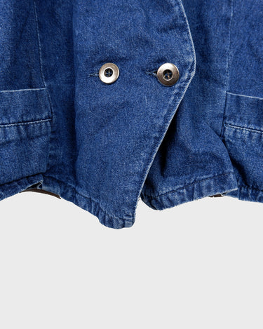 Indulge in your love for denim with this vintage 80s two rows blazer in classic blue. A must-have for any denim enthusiast, this jacket is a timeless addition to your wardrobe.