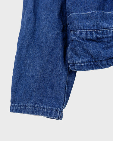 Indulge in your love for denim with this vintage 80s two rows blazer in classic blue. A must-have for any denim enthusiast, this jacket is a timeless addition to your wardrobe.